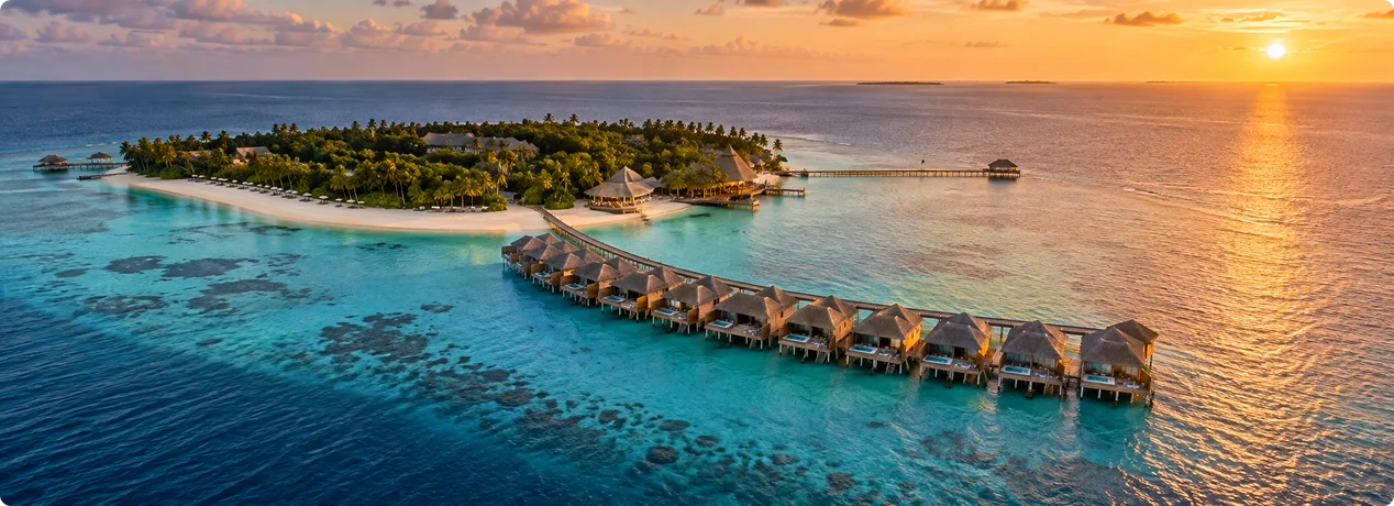 Centara Ras Fushi Resort Maldives with tropical Beach Villa and turquoise lagoon