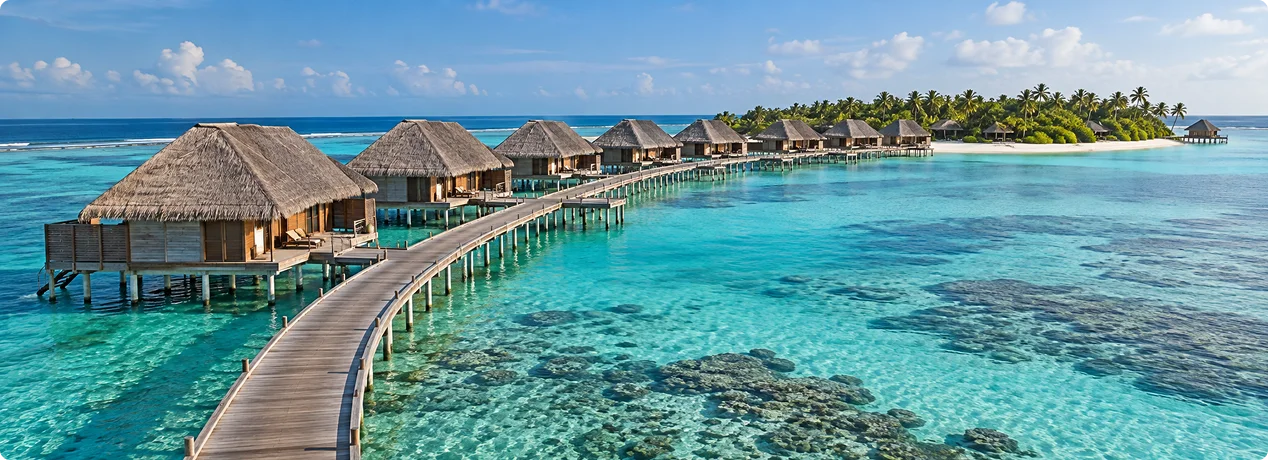 Medhufushi Island Resort Maldives with Water Villas and a turquoise lagoon