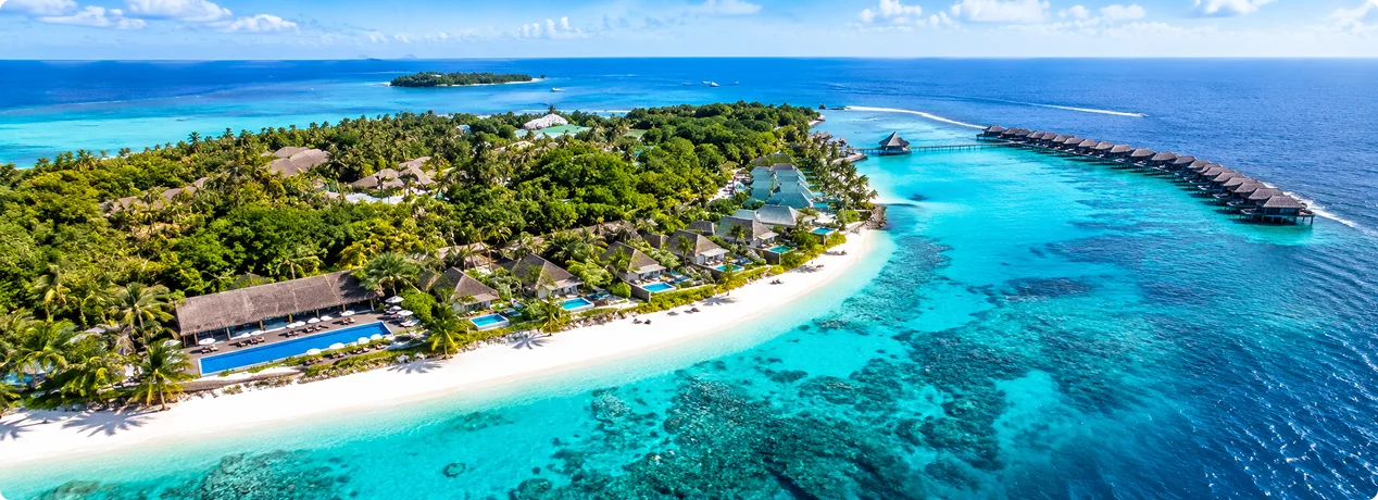 Sheraton Maldives Full Moon Resort with tropical beach and turquoise lagoon
